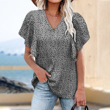 Load image into Gallery viewer, Short-sleeved blouse with V-neck and flower print