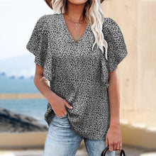 Load image into Gallery viewer, Short-sleeved blouse with V-neck and flower print
